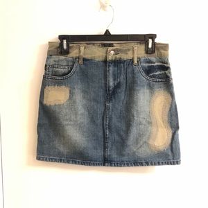 Vintage denim skirt and camouflage in the back.